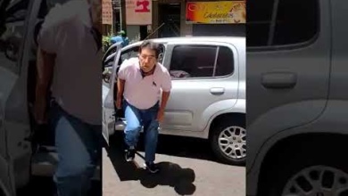 Foto de Confusão entre motorista e garis